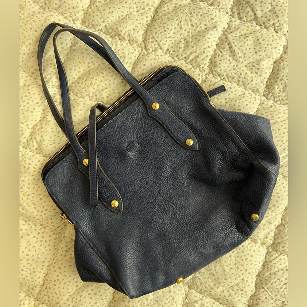 Blue leather handbag with gold accents. Just beautiful!